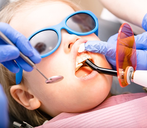 girl getting dental sealants