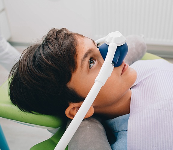 boy with nitrous mask on