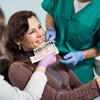 Woman seeking veneers in Aurora