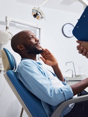 Man smiling at the dentist