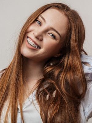 Woman smiling with braces