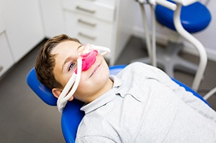 Child wearing a nasal mask