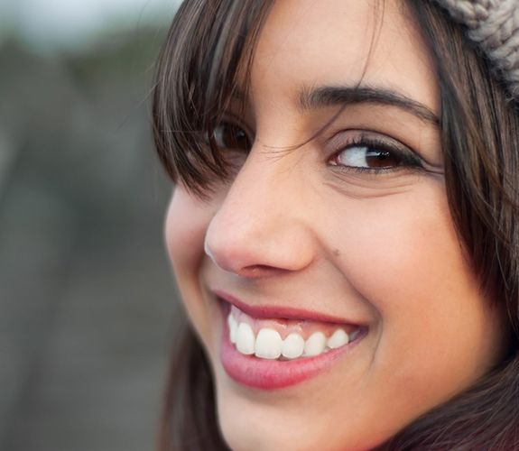 Girl after laser treatment of gum disease in Aurora