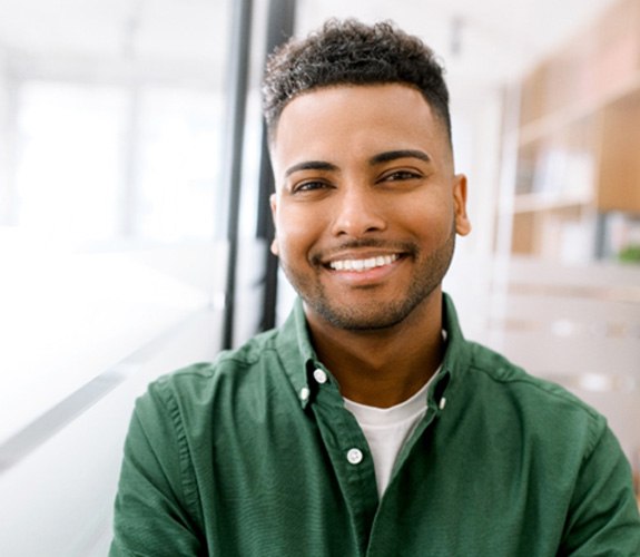 Man with polished veneers in Aurora 