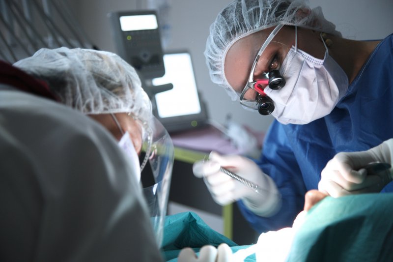 patient undergoing gum grafting procedure 