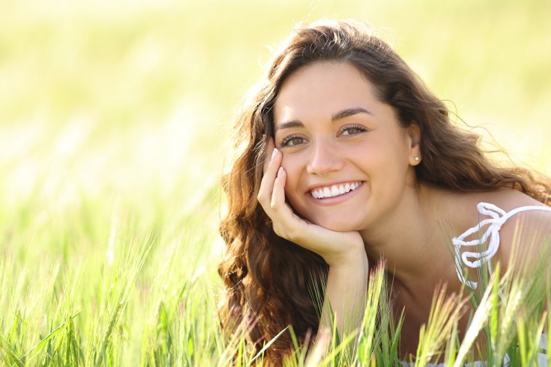 young girl smiling after cosmetic dentistry