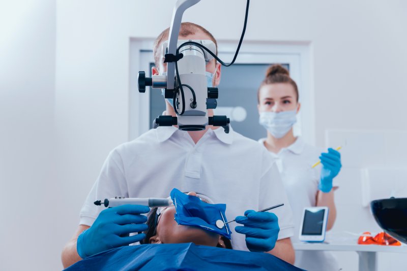 dentist performing a root canal